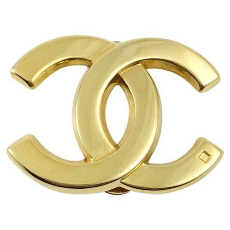 chanel brooch logo.